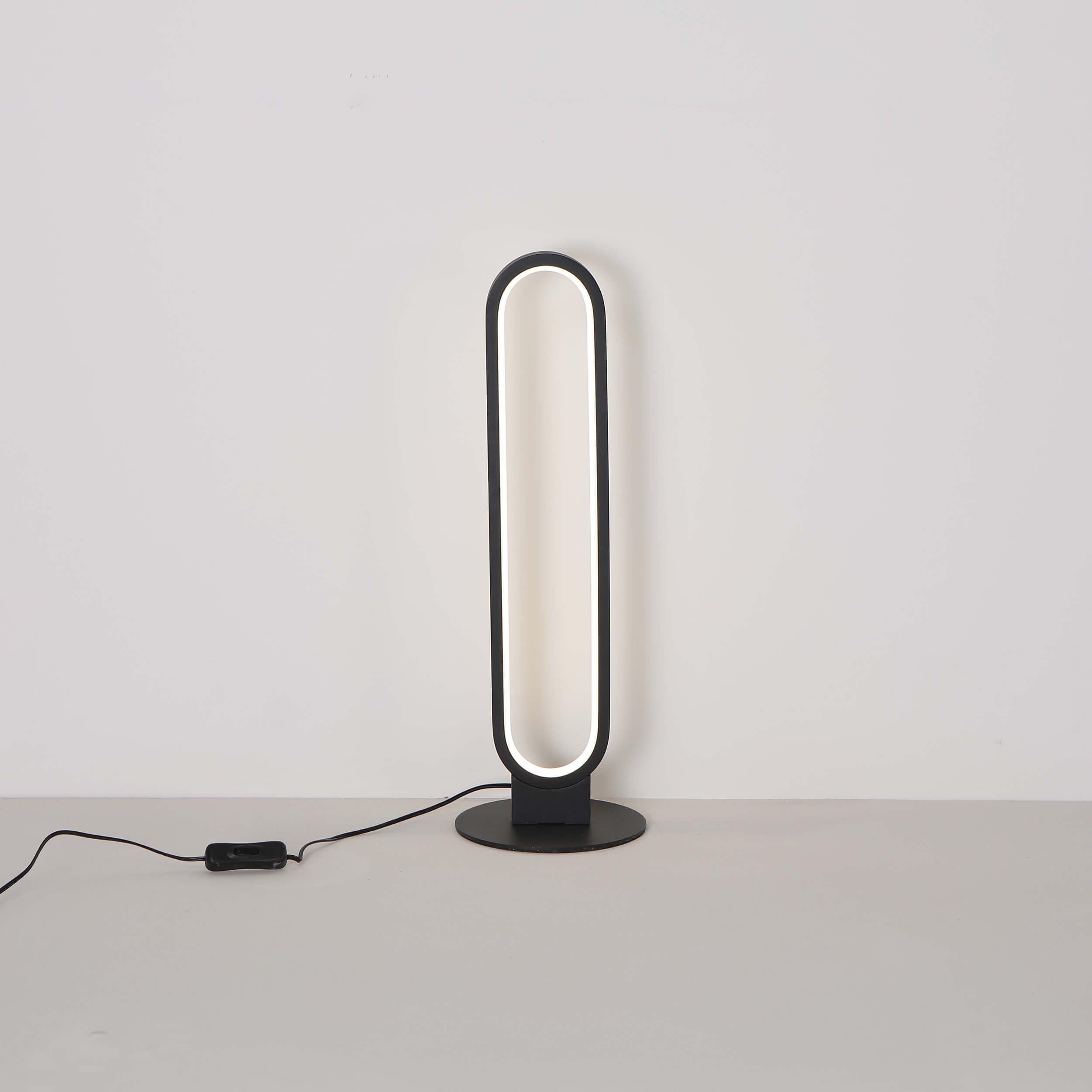 Sleek battery-operated table light with USB-C charging port and minimalist design