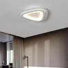 Triangle led ceiling lamp installed in a bathroom