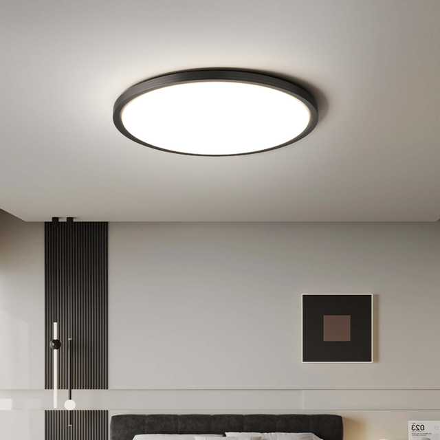 flush mounted round plate led ceiling light installed in bedroom