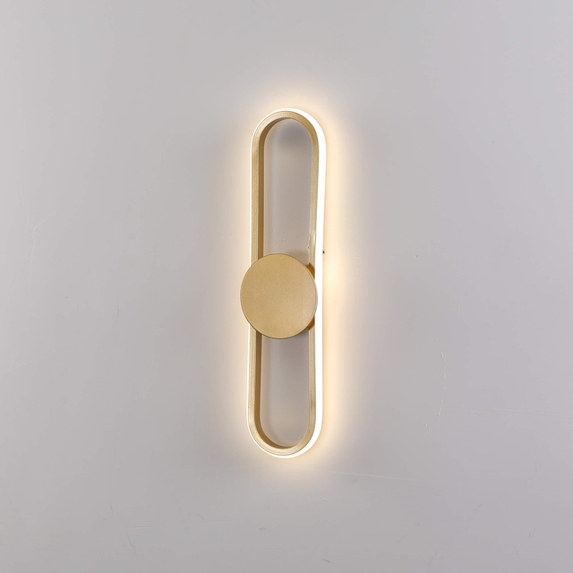 Modern metallic geometric wall-mounted lighting fixtures in contemporary interior
