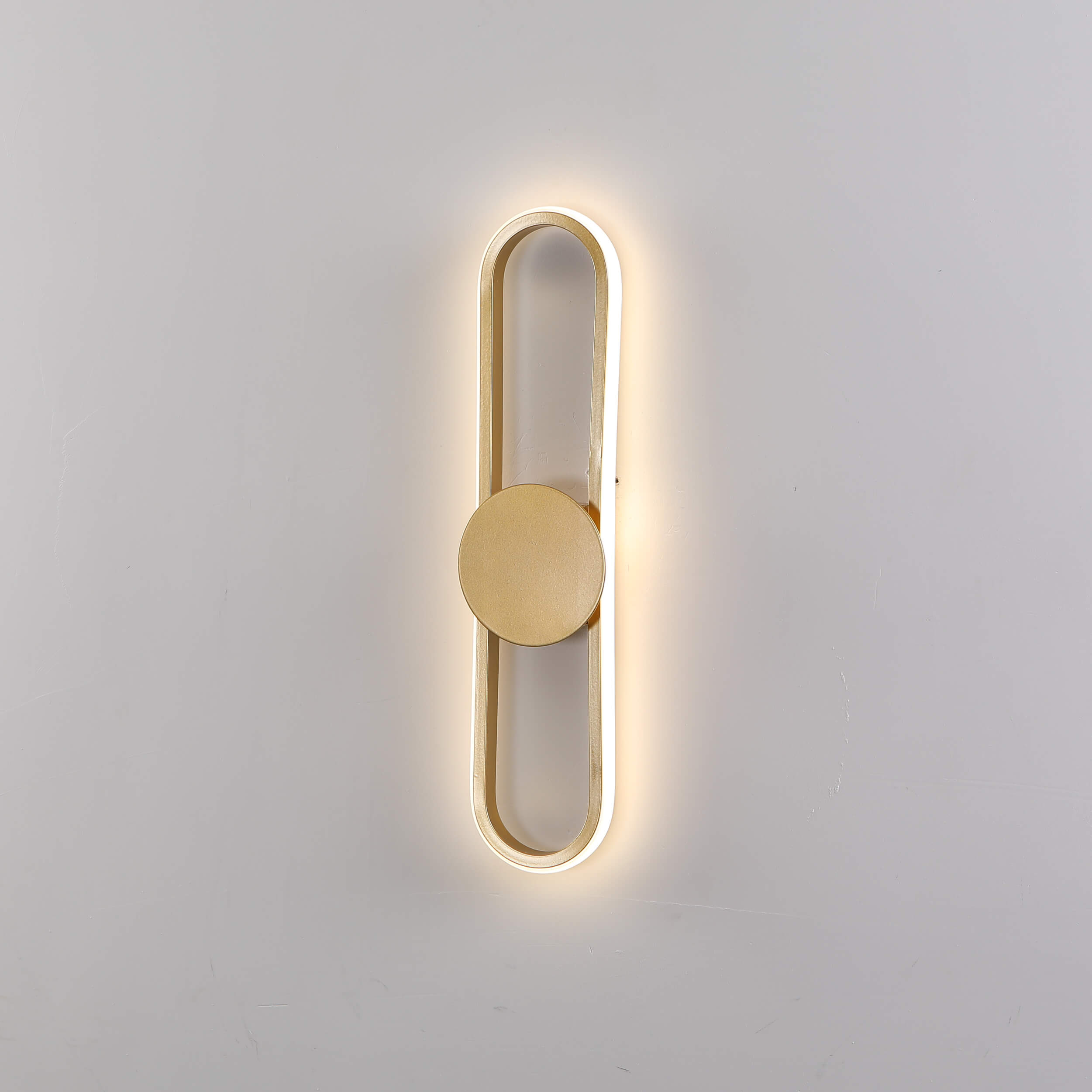 Modern metallic geometric wall-mounted lighting fixtures in contemporary interior