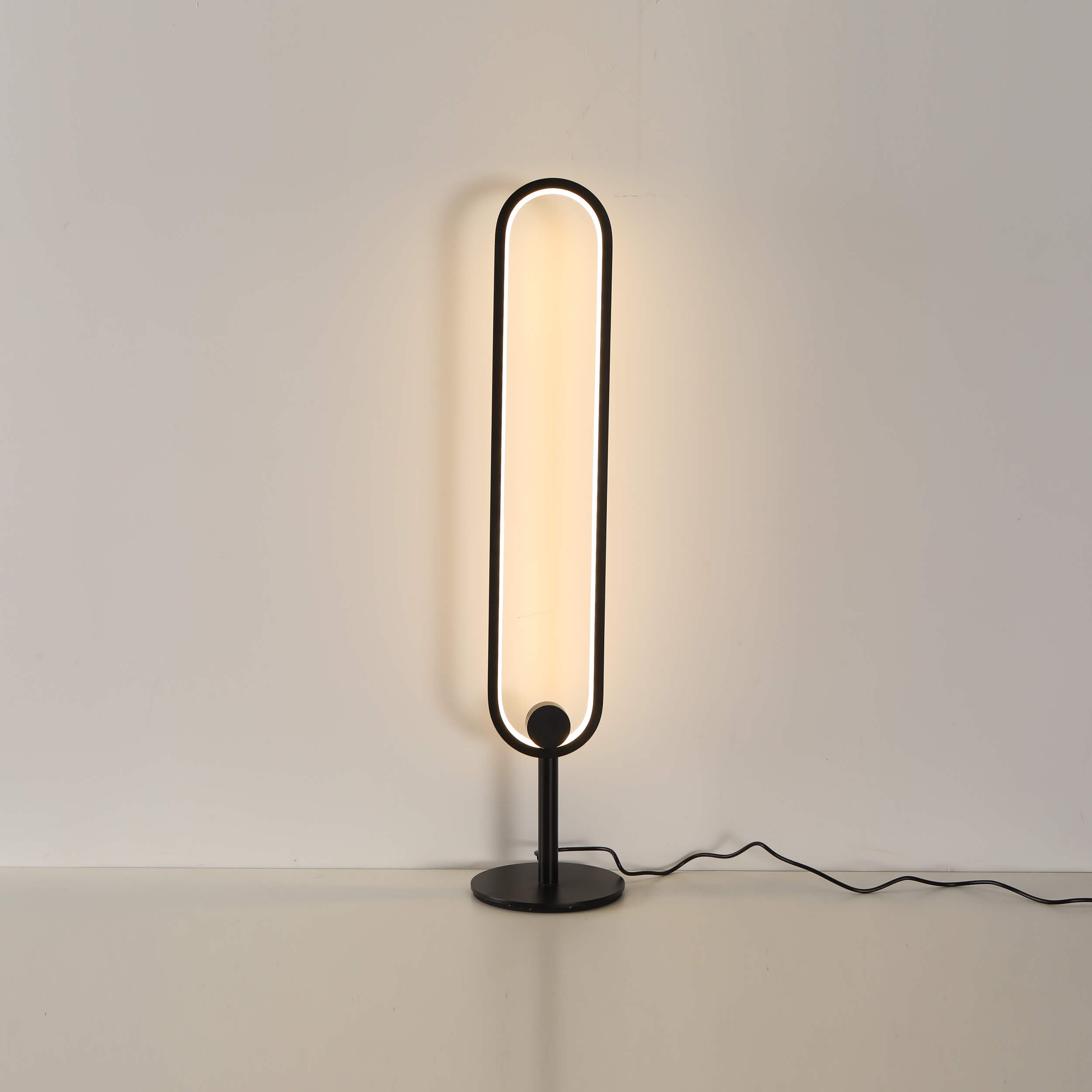 Modern cordless table lamp with metallic finish and adjustable brightness settings