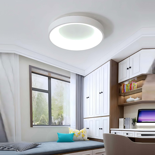 white circular led ceiling lamp installed in bedroom