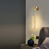 Modern metallic geometric wall-mounted lighting fixtures in contemporary interior