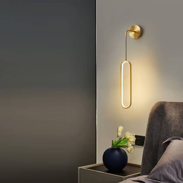 Modern metallic geometric wall-mounted lighting fixtures in contemporary interior