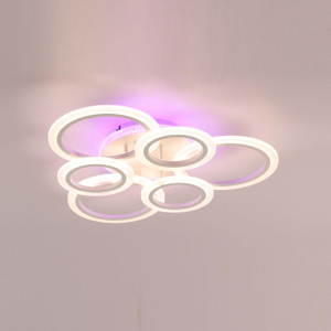 A modern, minimalist ceiling light fixture with three circular LED panels in a white finish.