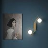 Modern Brass Lighting Fixture with Spherical Bulbs