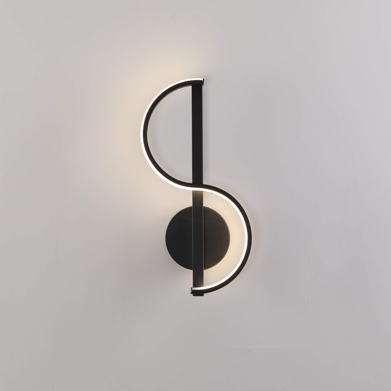 Geometric wall-mounted lamp with a sleek, sculptural appearance