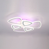 Abstract geometric ceiling light with interconnected triangular shapes emitting a soft, diffused glow.