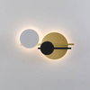 Architectural wall light with a balanced, asymmetric composition
