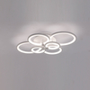 The rings are made of a matte black material, which gives the fixture a sophisticated and minimalist aesthetic.