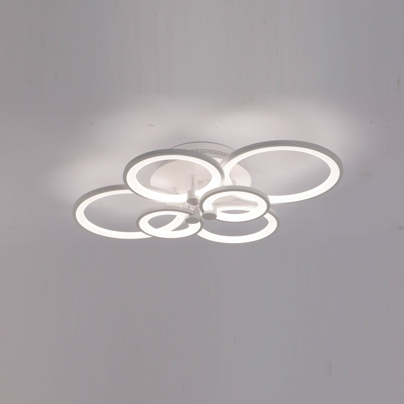 The rings are made of a matte black material, which gives the fixture a sophisticated and minimalist aesthetic.