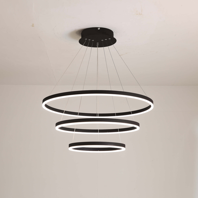 Modern minimalist gold-trimmed ceiling pendant light with crystal accents for contemporary living rooms