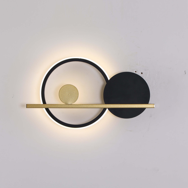 Stylized wall light fixture combining simple forms in a harmonious arrangement