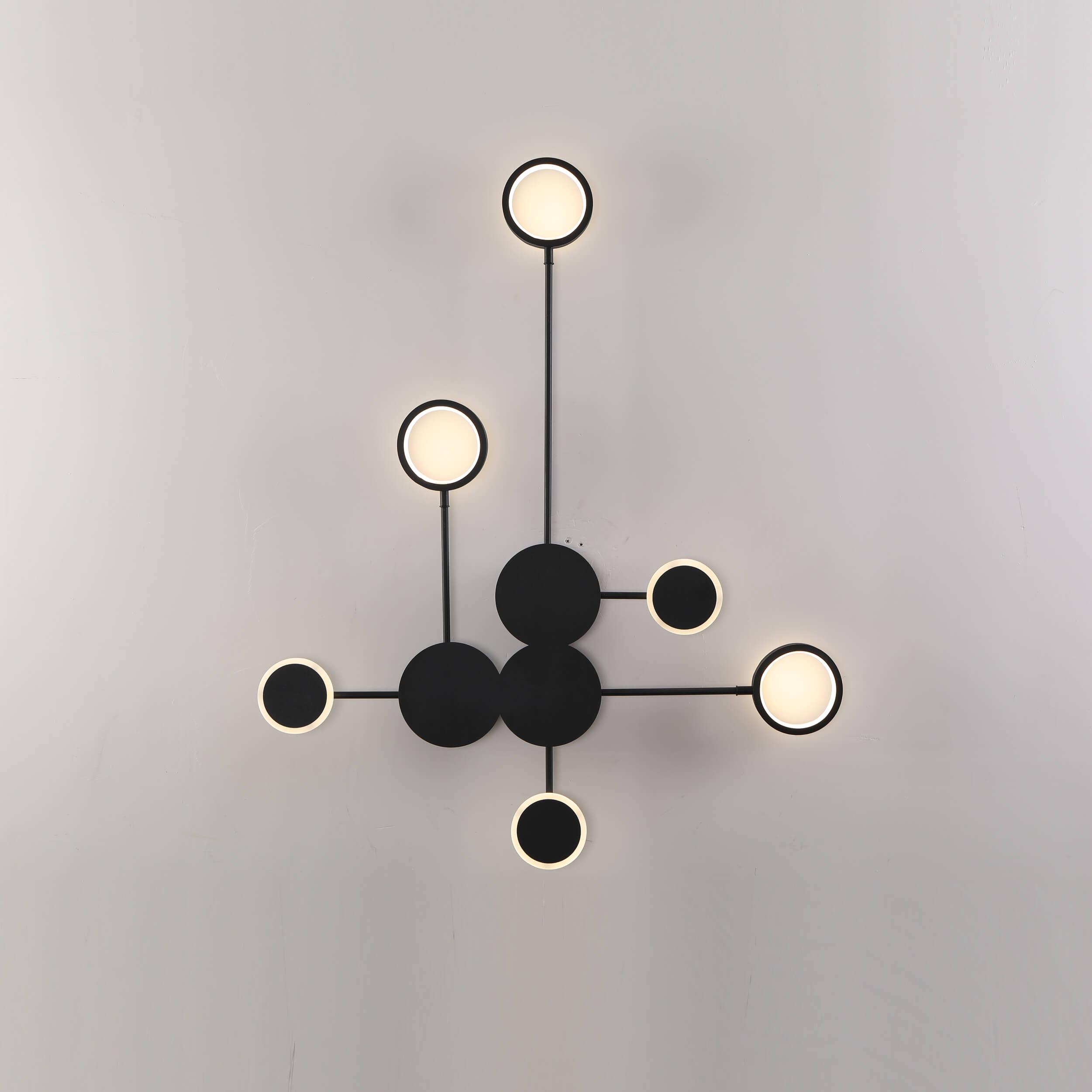 Sleek Black Wall Mounted Light Sculpture
